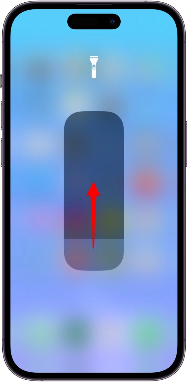 A segmented bar will appear on screen. Swipe up on the bar to turn up the flashlight's brightness. 