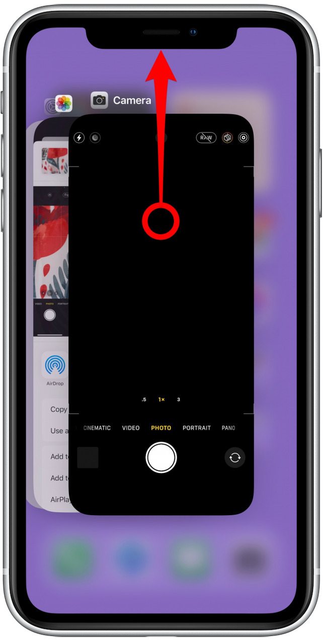 Once you locate the Camera app, tap it and swipe up in a flicking motion so that it dissapears off the screen.